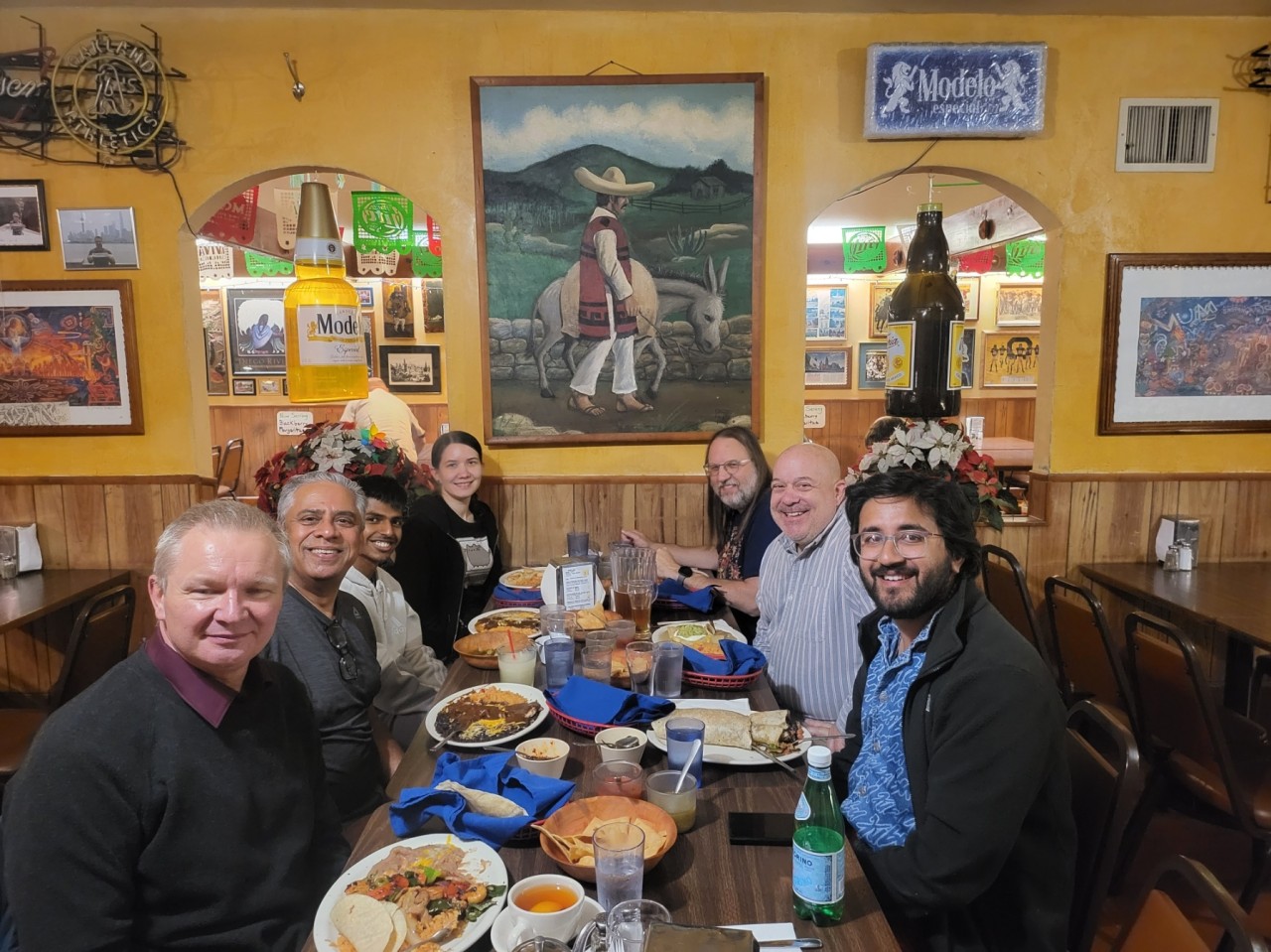 Alexandra Lukinicheva and LOCH Technologies colleagues at a team dinner